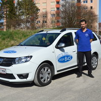 Taxi und Mitarbeiter von City Taxi Haid